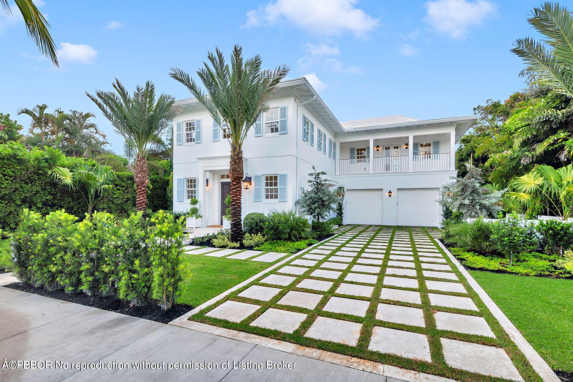 320 Sunset Road West Palm Beach, FL 33401 - Photo 1 of 35 a front view of a house with a yard