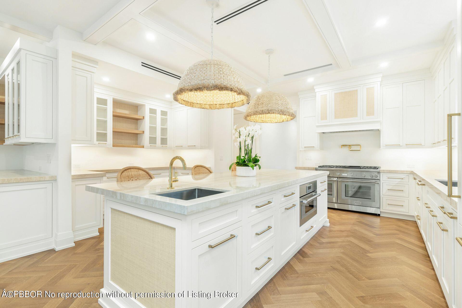 320 Sunset Road West Palm Beach, FL 33401 - Photo 13 of 35 a kitchen with stainless steel appliances granite countertop a sink and stove