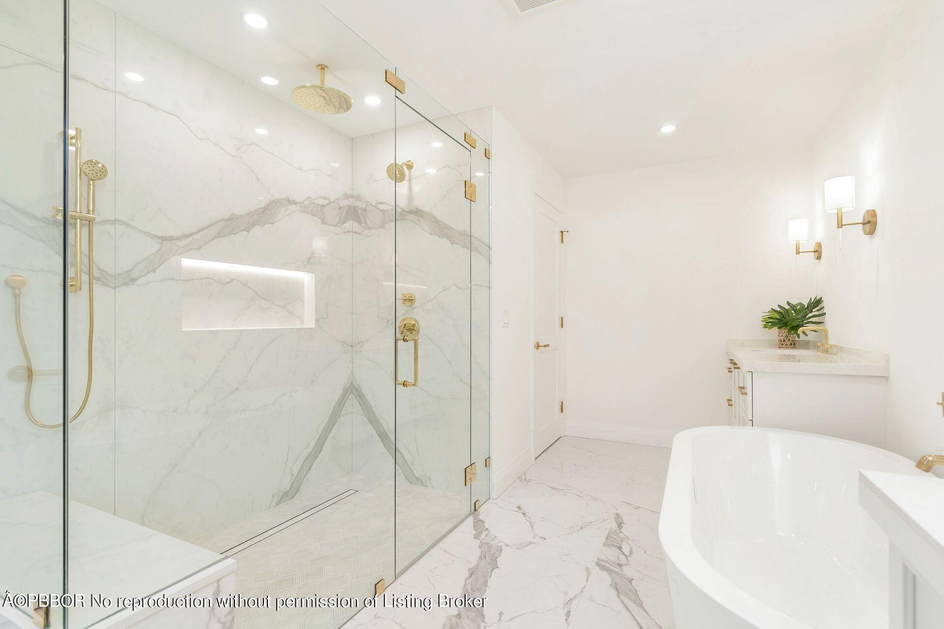320 Sunset Road West Palm Beach, FL 33401 - Photo 23 of 35 a bathroom with a bathtub and a shower