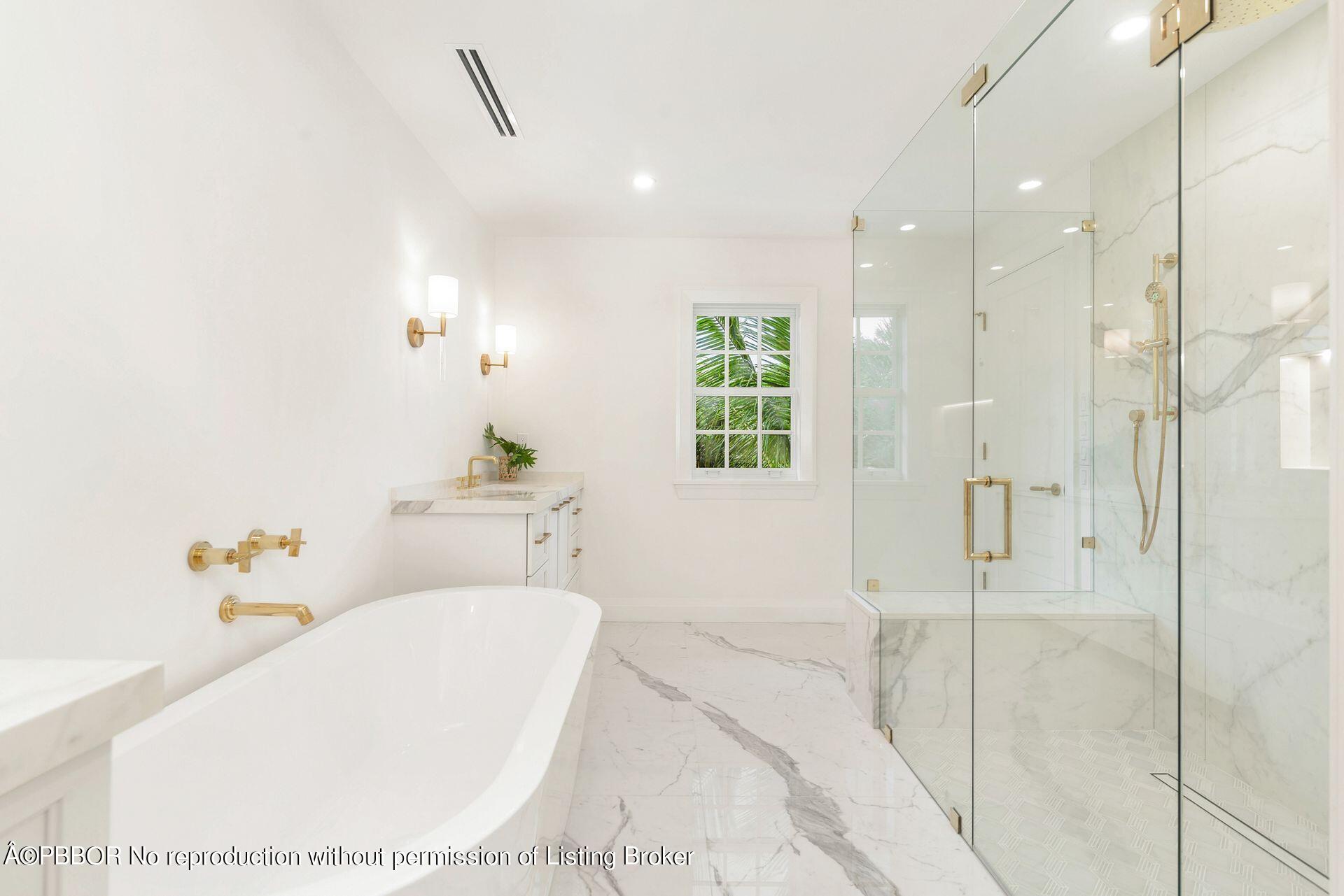 320 Sunset Road West Palm Beach, FL 33401 - Photo 24 of 35 a bathroom with a tub sink and mirror