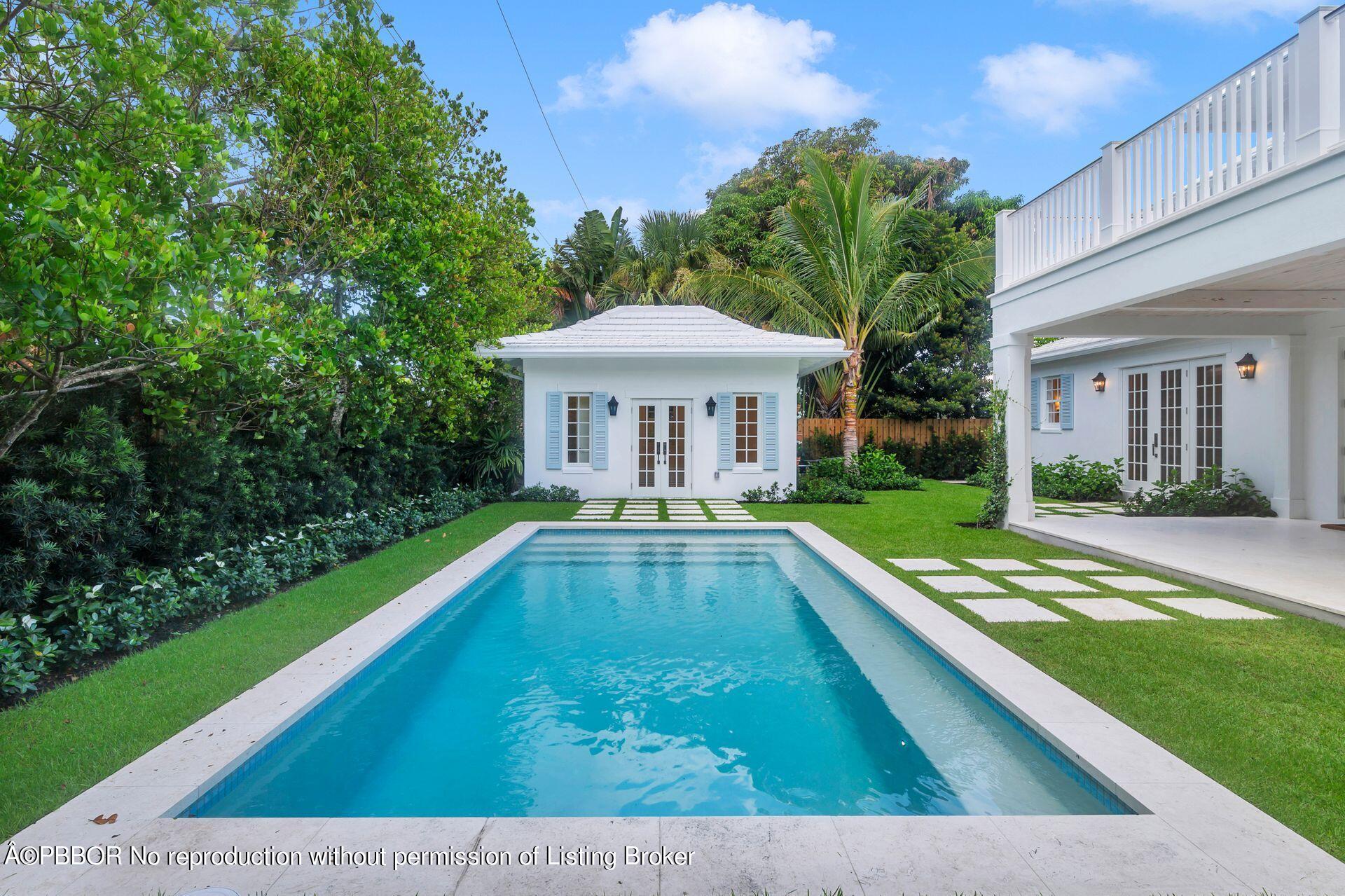 320 Sunset Road West Palm Beach, FL 33401 - Photo 26 of 35 a view of swimming pool with a garden