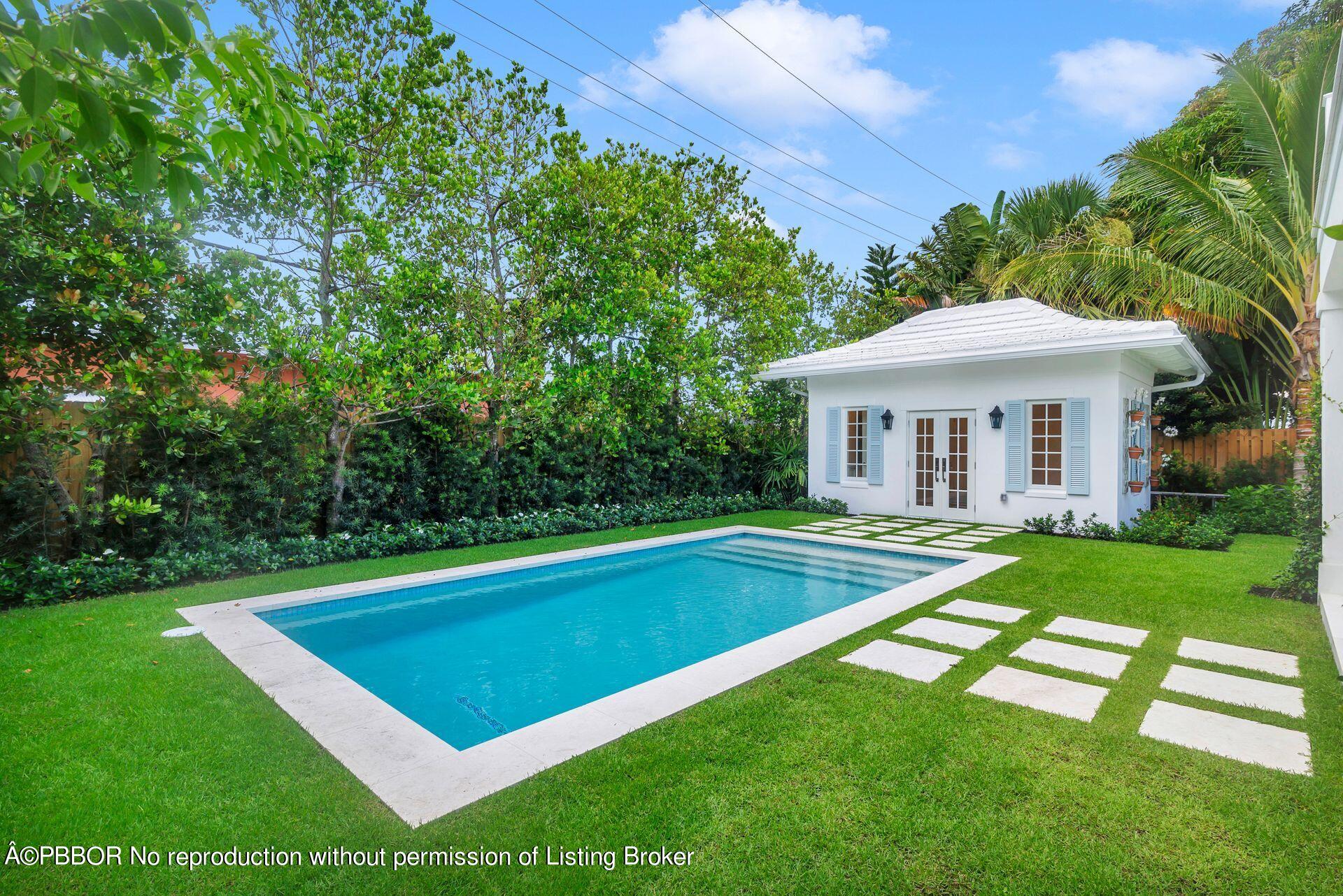 320 Sunset Road West Palm Beach, FL 33401 - Photo 27 of 35 a view of outdoor space yard and swimming pool