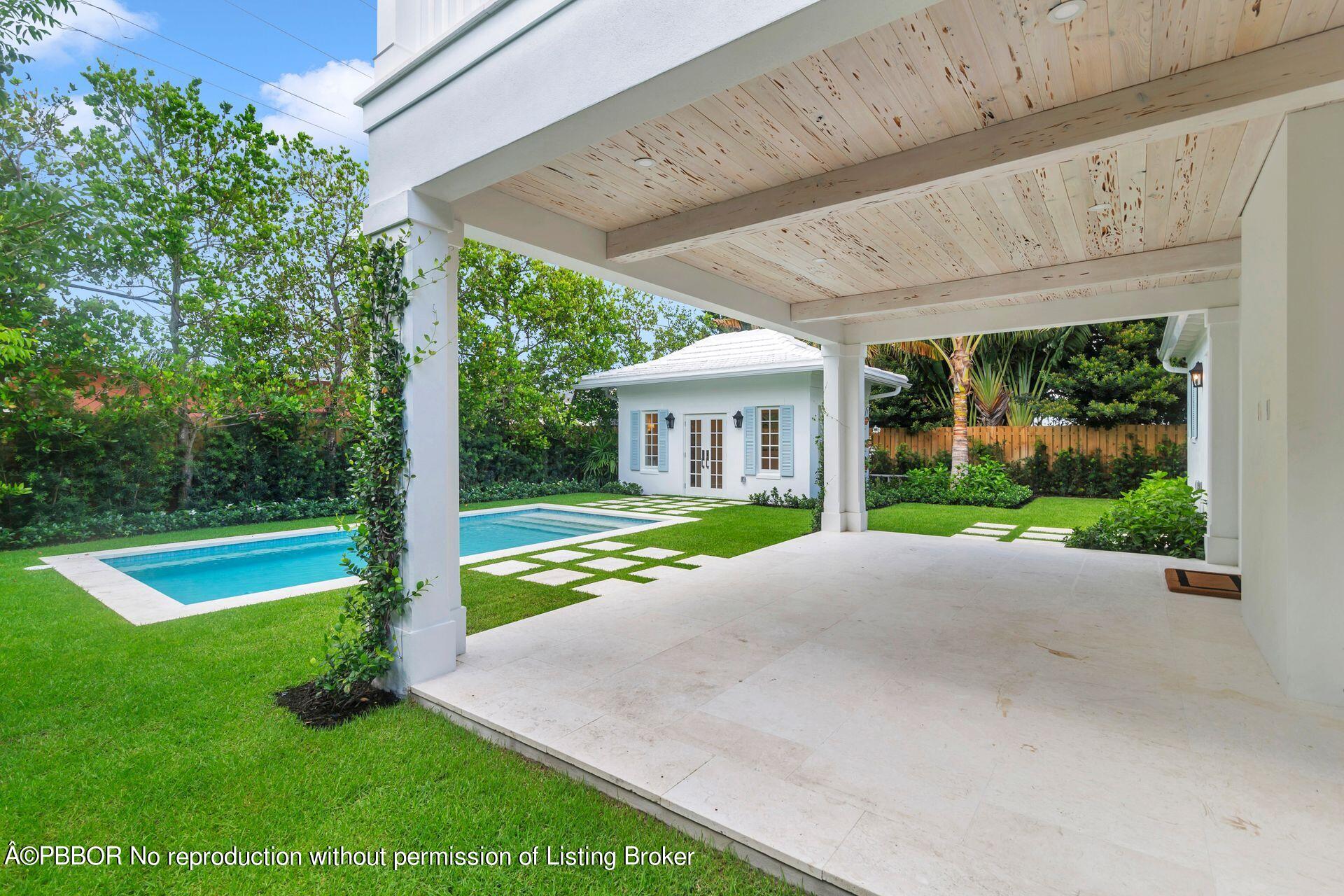 320 Sunset Road West Palm Beach, FL 33401 - Photo 28 of 35 a view of a house with backyard and porch