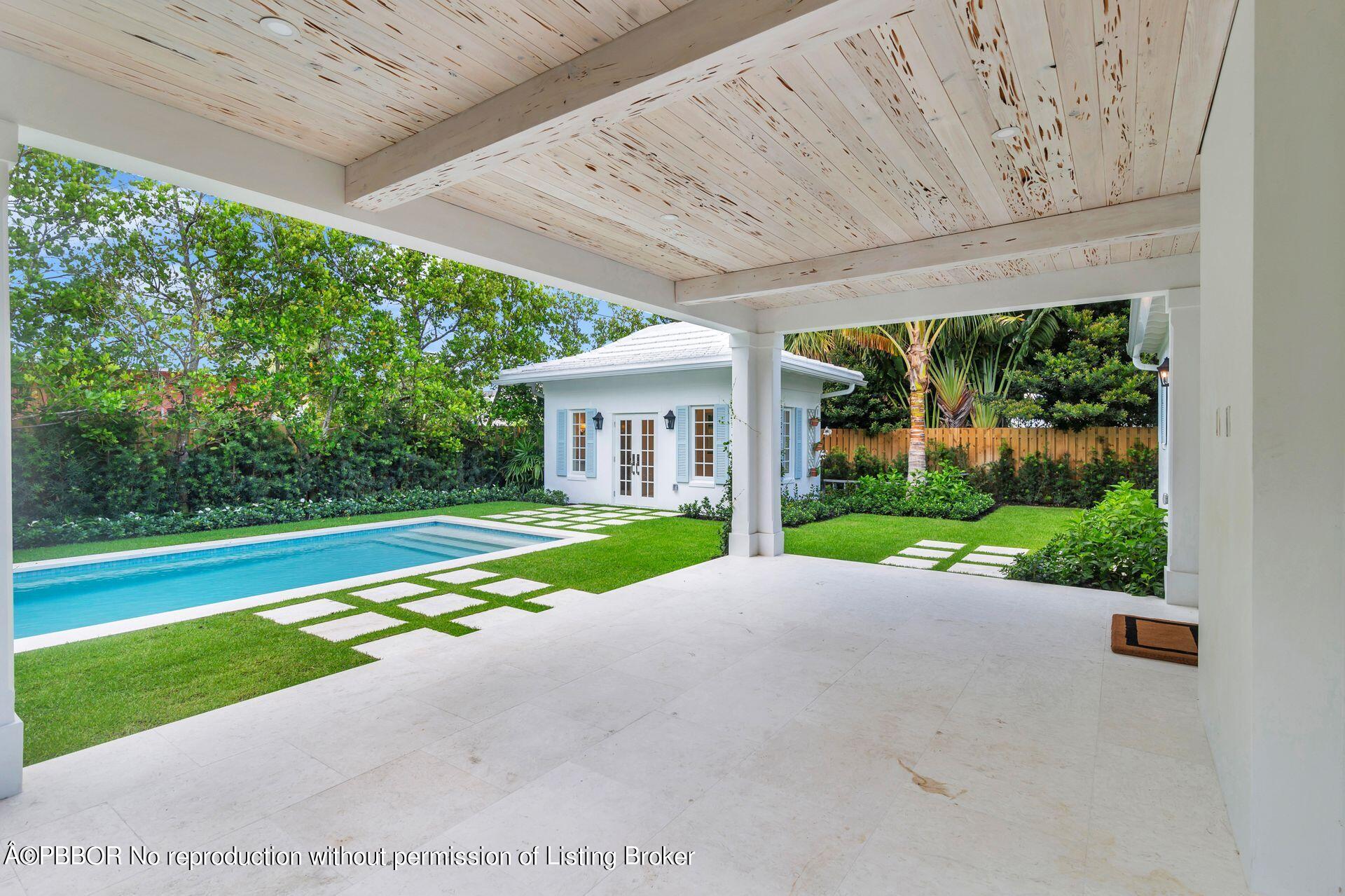320 Sunset Road West Palm Beach, FL 33401 - Photo 29 of 35 a view of a house with a yard