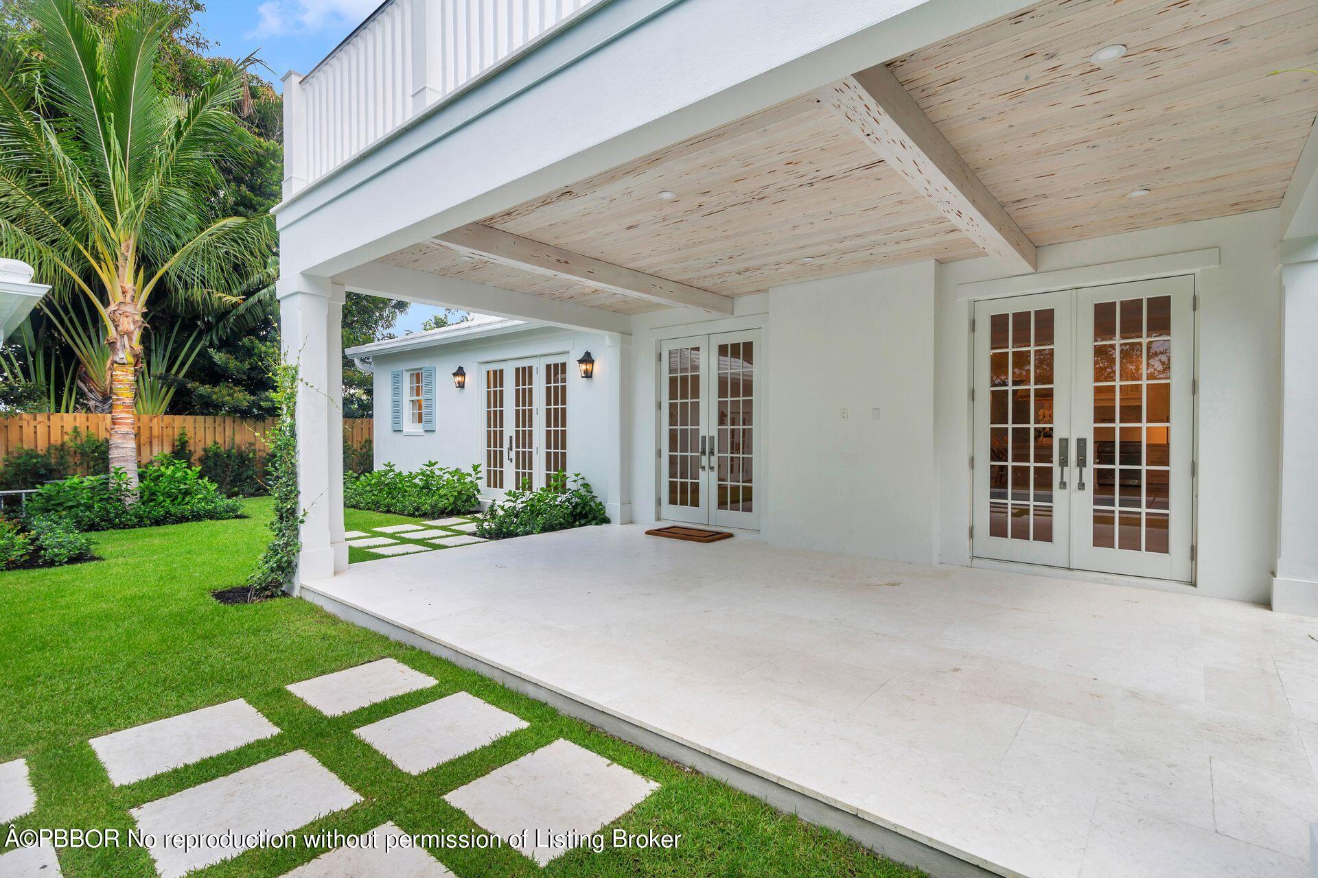 320 Sunset Road West Palm Beach, FL 33401 - Photo 30 of 35 front view of a house with a yard