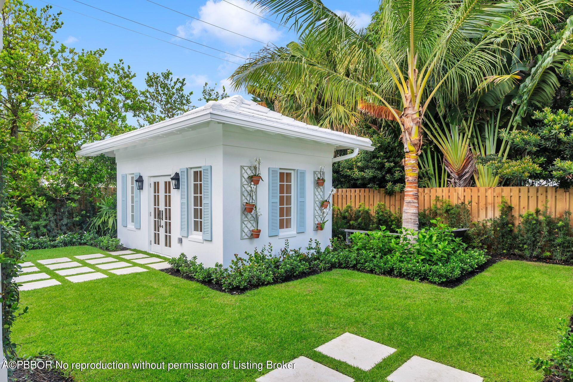 320 Sunset Road West Palm Beach, FL 33401 - Photo 33 of 35 a view of a house with a yard