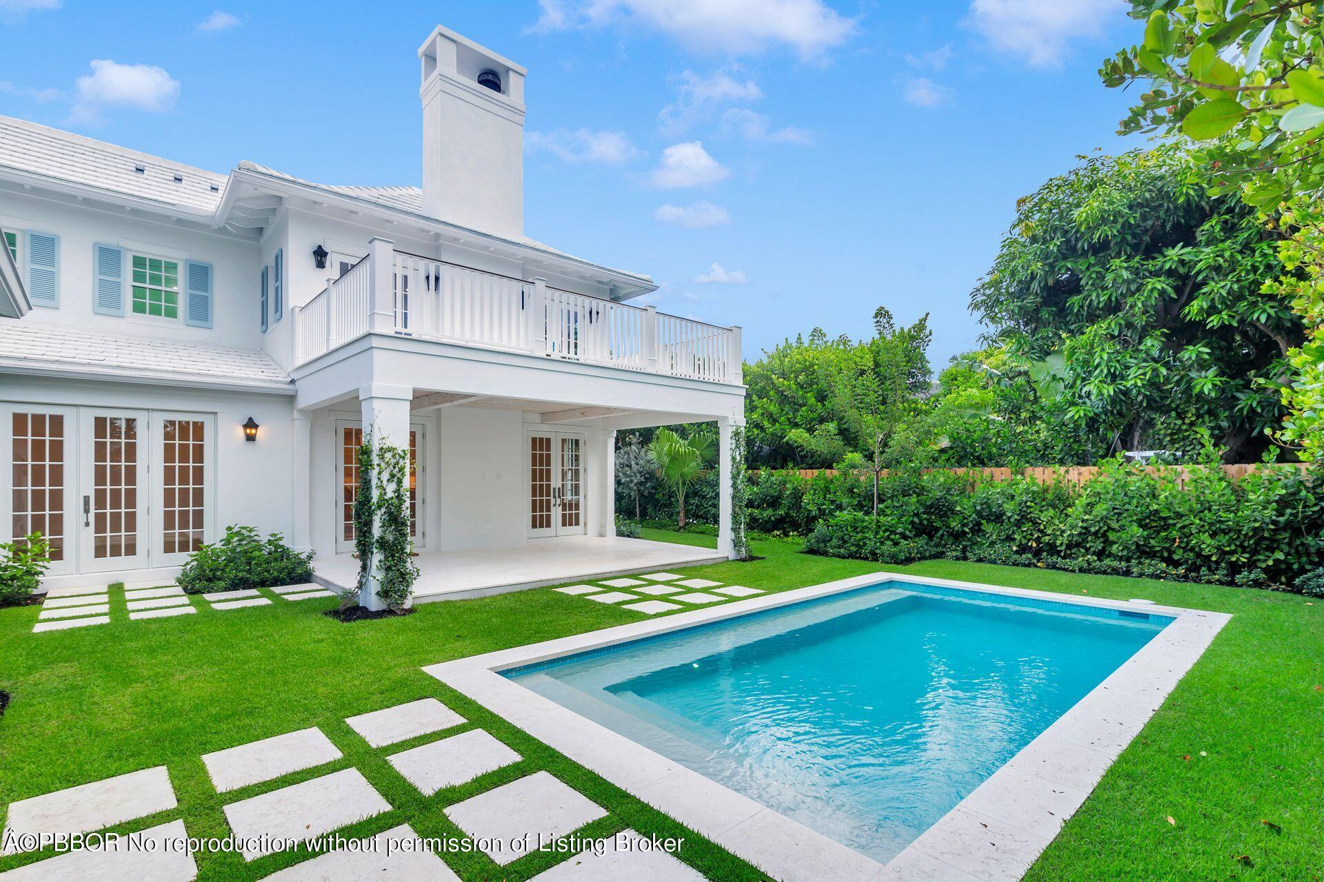 320 Sunset Road West Palm Beach, FL 33401 - Photo 34 of 35 a view of a house with swimming pool yard and patio