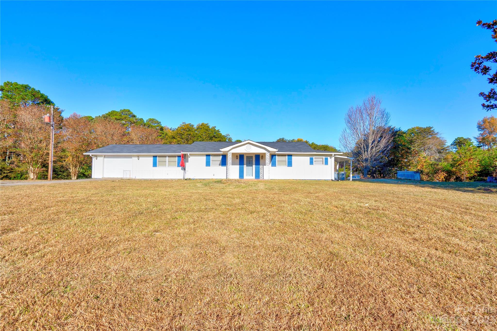 128 Burley's Knob Bostic, NC 28018 - Photo 1 of 19 a front view of a house with a yard