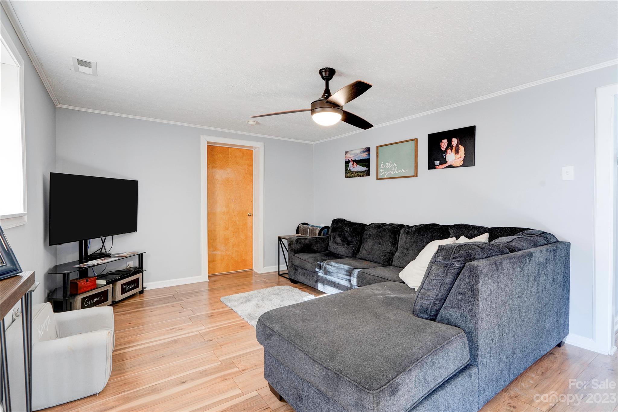 128 Burley's Knob Bostic, NC 28018 - Photo 19 of 19 a living room with furniture and a flat screen tv