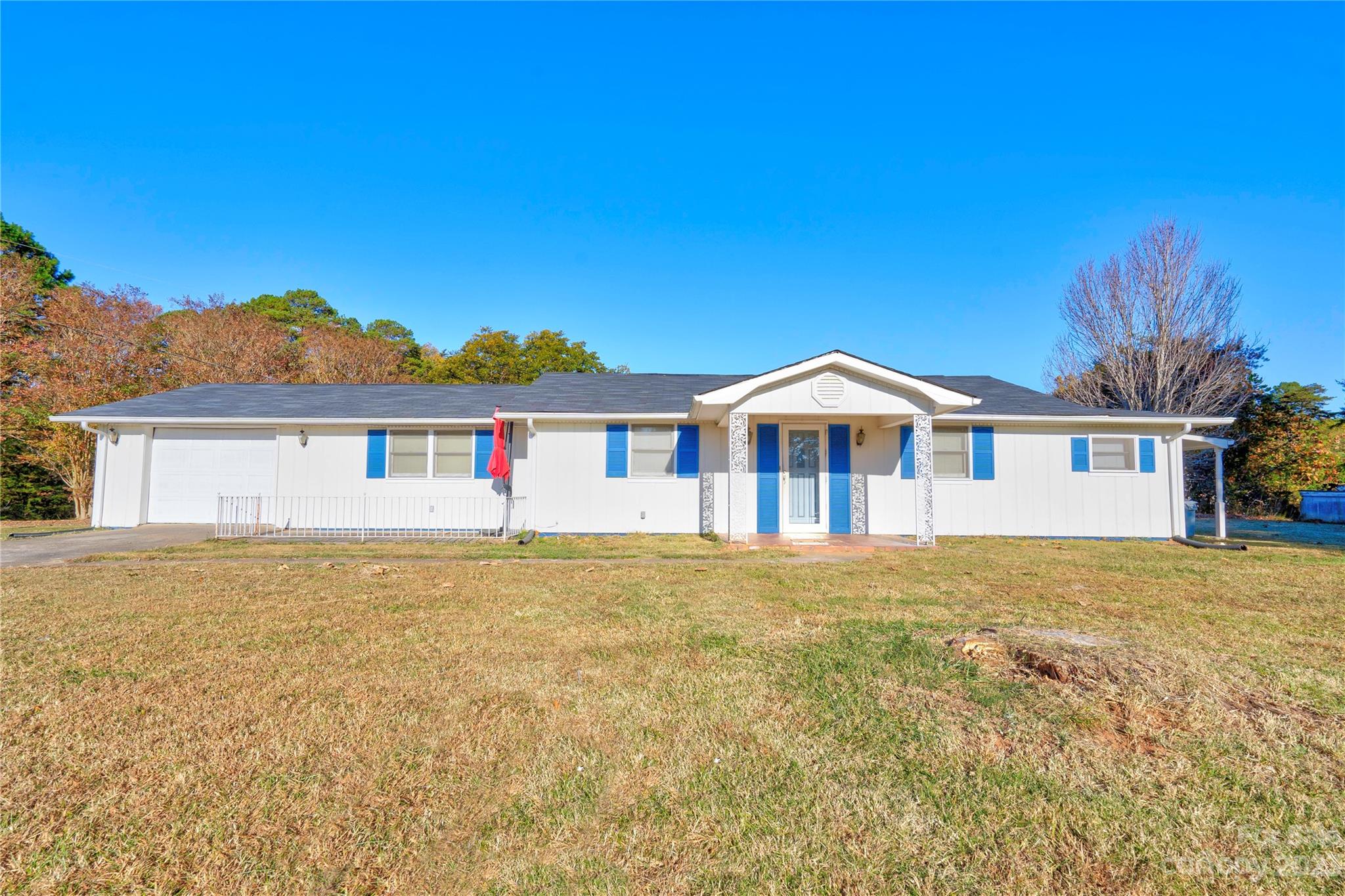 128 Burley's Knob Bostic, NC 28018 - Photo 2 of 19 a front view of a house with a yard