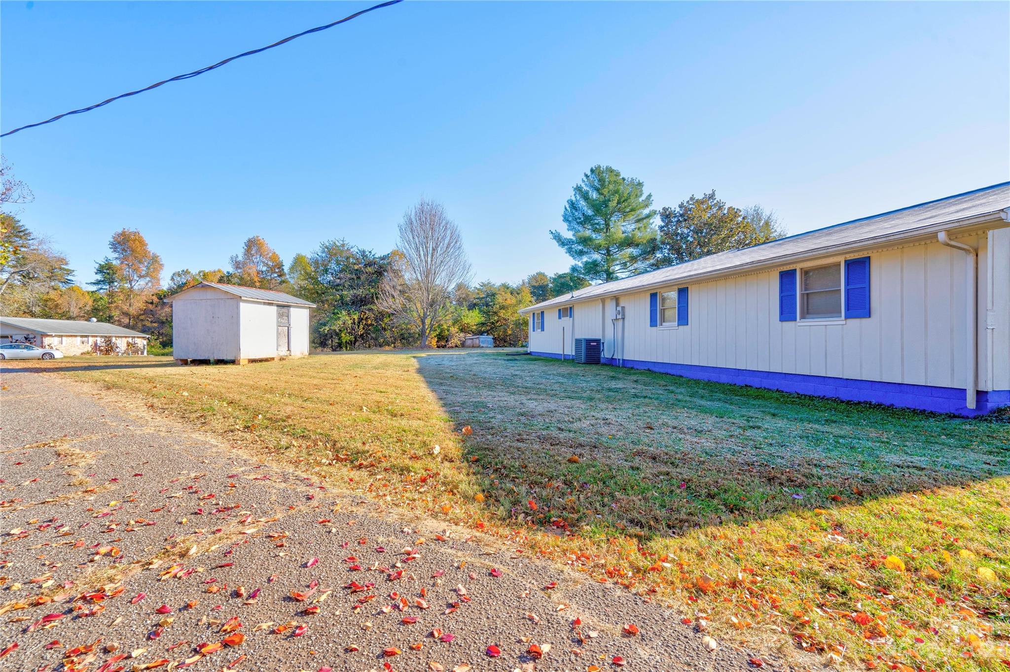 128 Burley's Knob Bostic, NC 28018 - Photo 4 of 19 a view of a house with backyard and tree