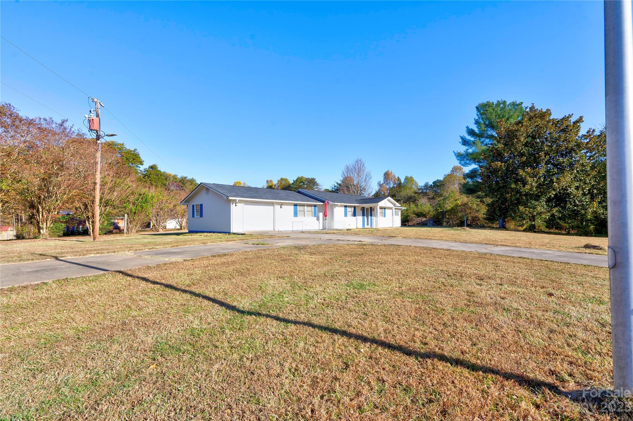 128 Burley's Knob Bostic, NC 28018 - Photo 6 of 19 a view of an house with a yard