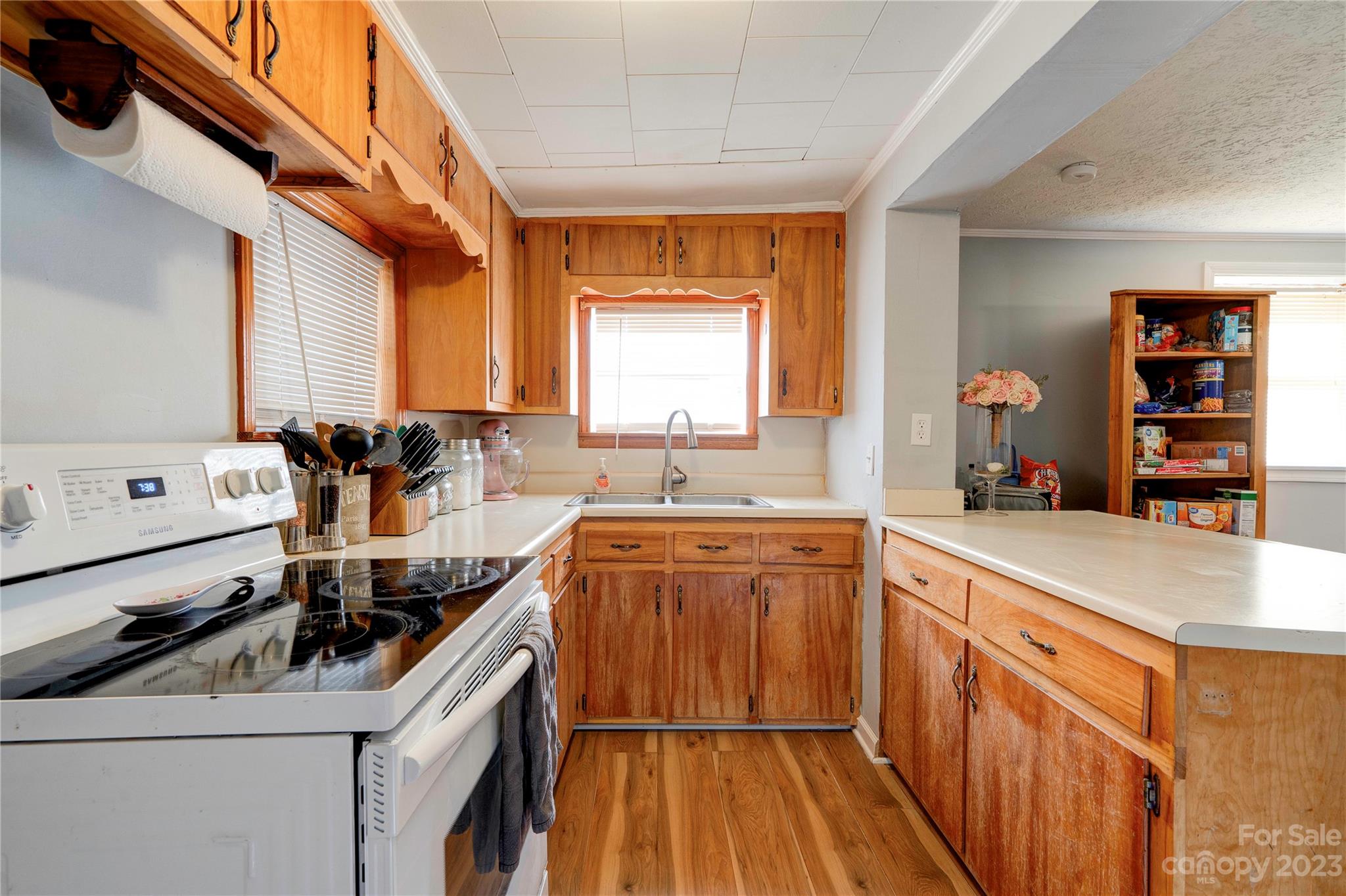 128 Burley's Knob Bostic, NC 28018 - Photo 8 of 19 a kitchen with stainless steel appliances granite countertop a sink stove and cabinets