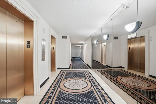 a bathroom with a sink a mirror and a shower