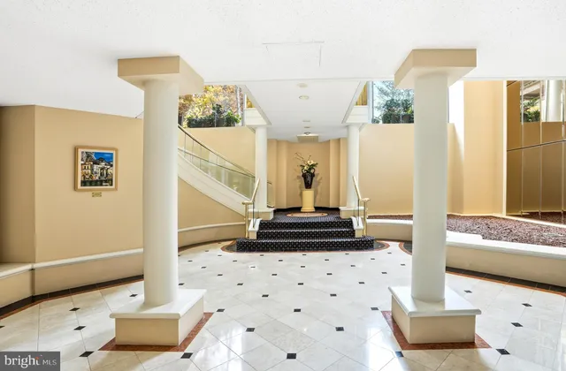 a view of a bedroom with furniture