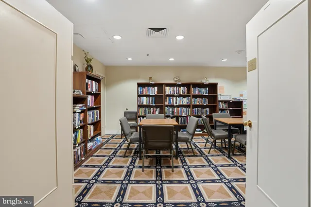 a view of a workspace with furniture