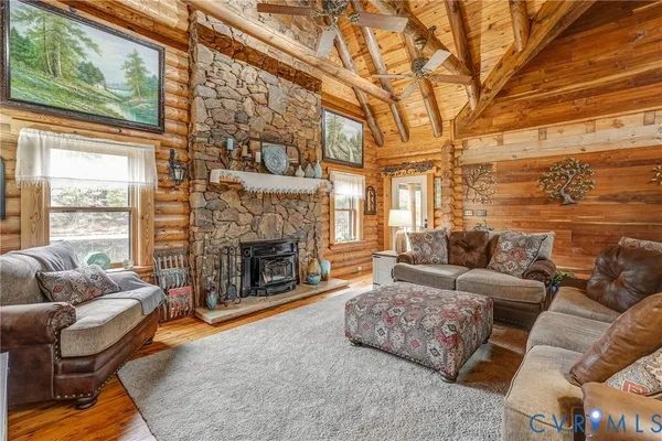 a bed sitting in a spacious bedroom next to a window