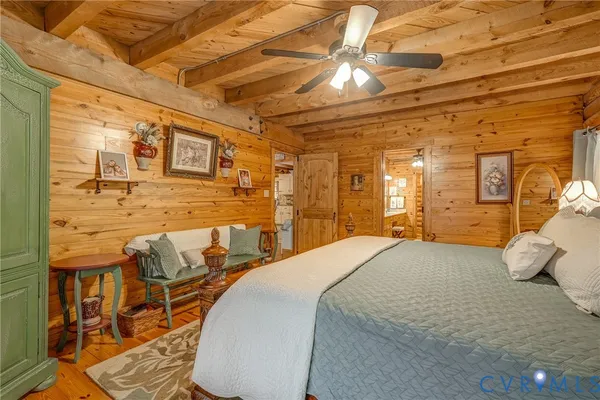 a bed room with a bed and a window