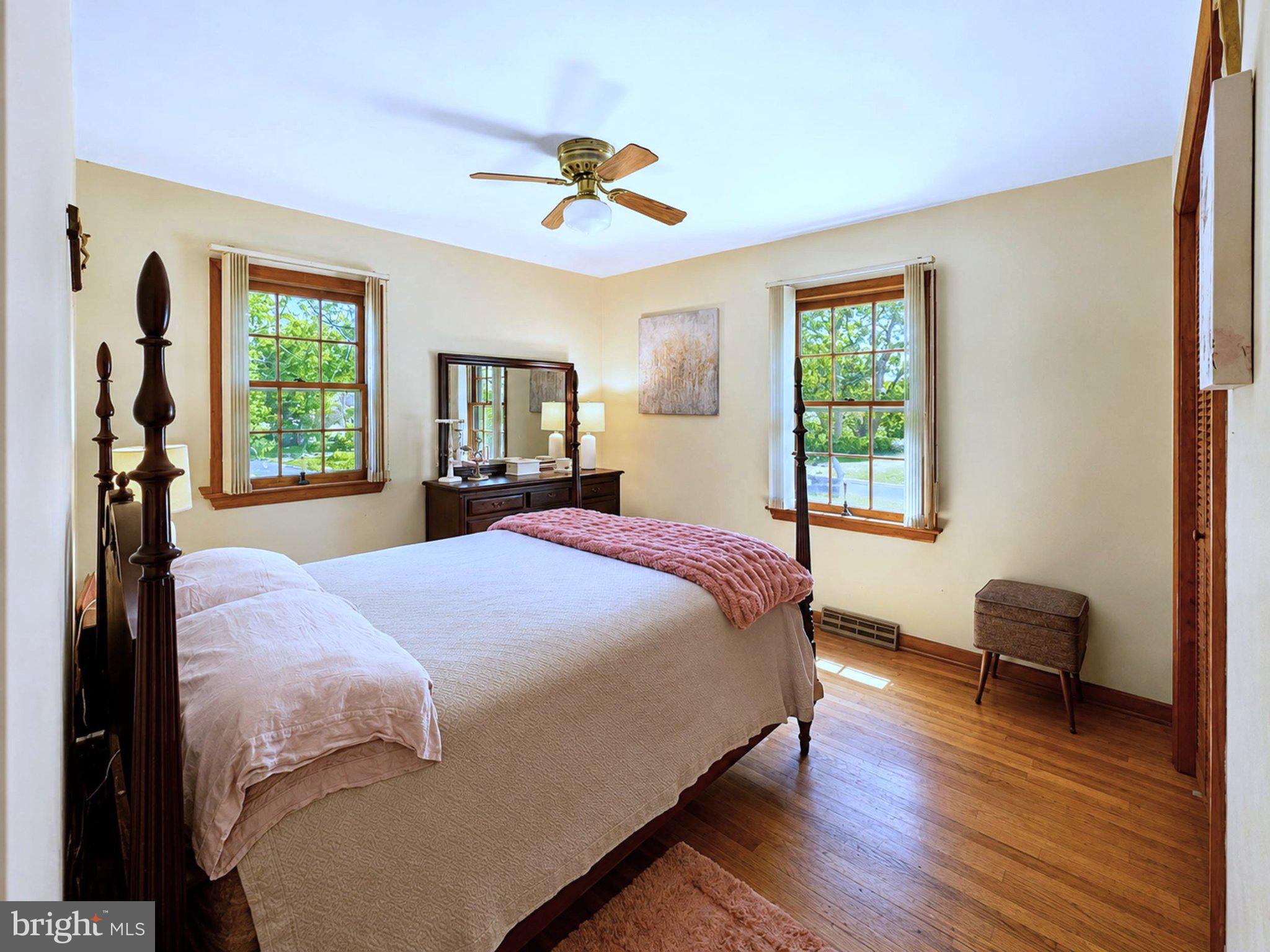 610 Beach Road White Stone, VA 22578 - Photo 13 of 23 Serene bedroom with natural light.