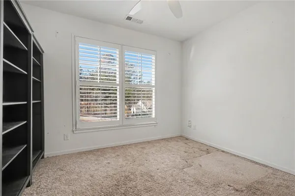 an empty room with windows