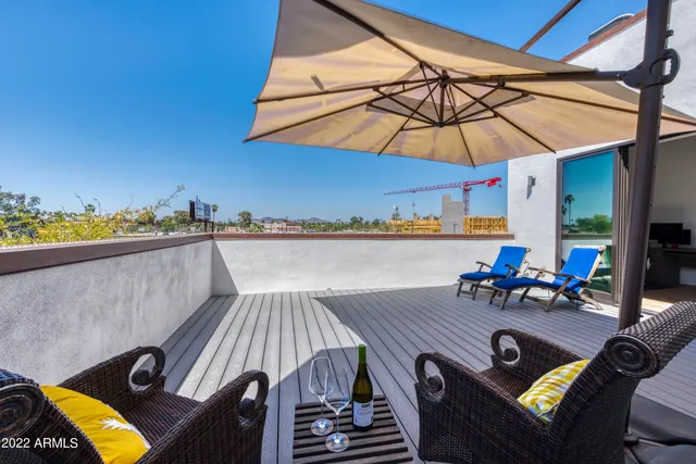 a view of a terrace with seating space