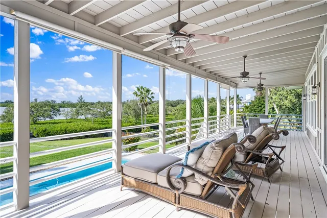 a terrace view with sitting space and lake view