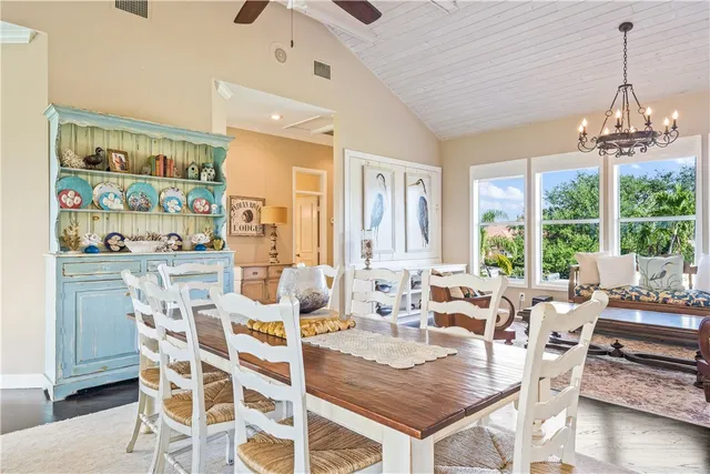 a kitchen with a sink and large window
