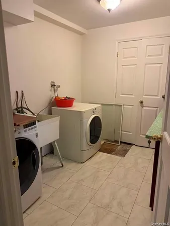 a room with a washing machine and dryer