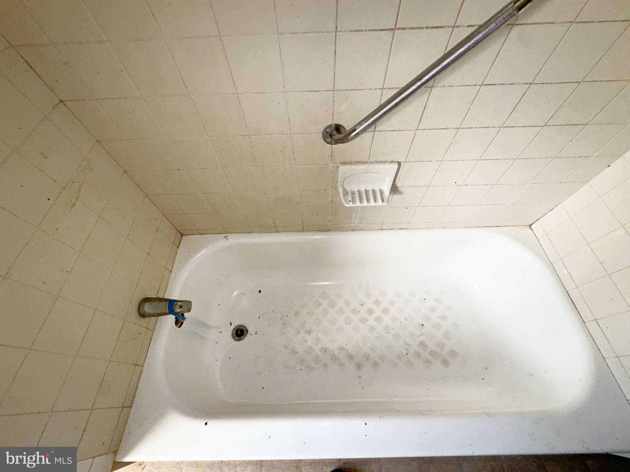 2141 Vine Street Baltimore, MD 21223 - Photo 15 of 15 a bathroom with a shower