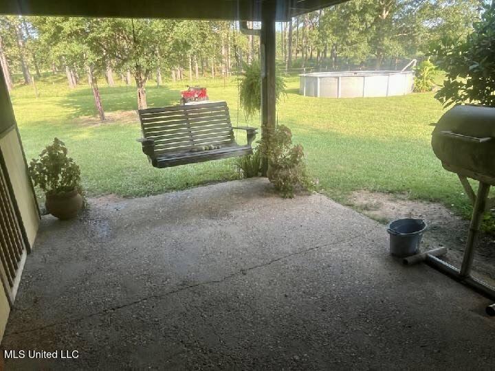 722 Holmesville Road Jayess, MS 39641 - Photo 12 of 47 Back patio pool view