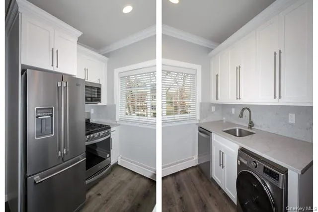 a kitchen with stainless steel appliances a stove a sink and a refrigerator