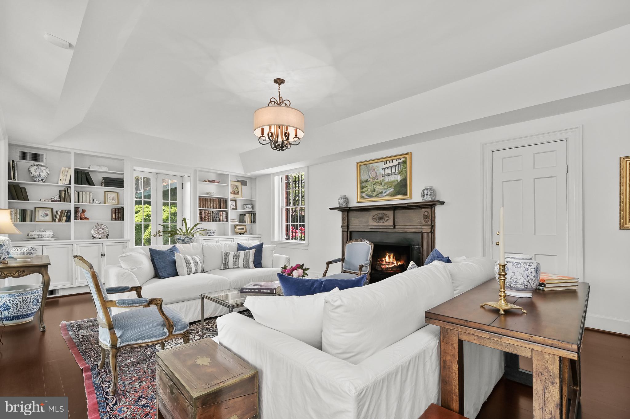 3508 Prospect Street Northwest Washington, DC 20007 - Photo 18 of 39 a living room with furniture and a fireplace