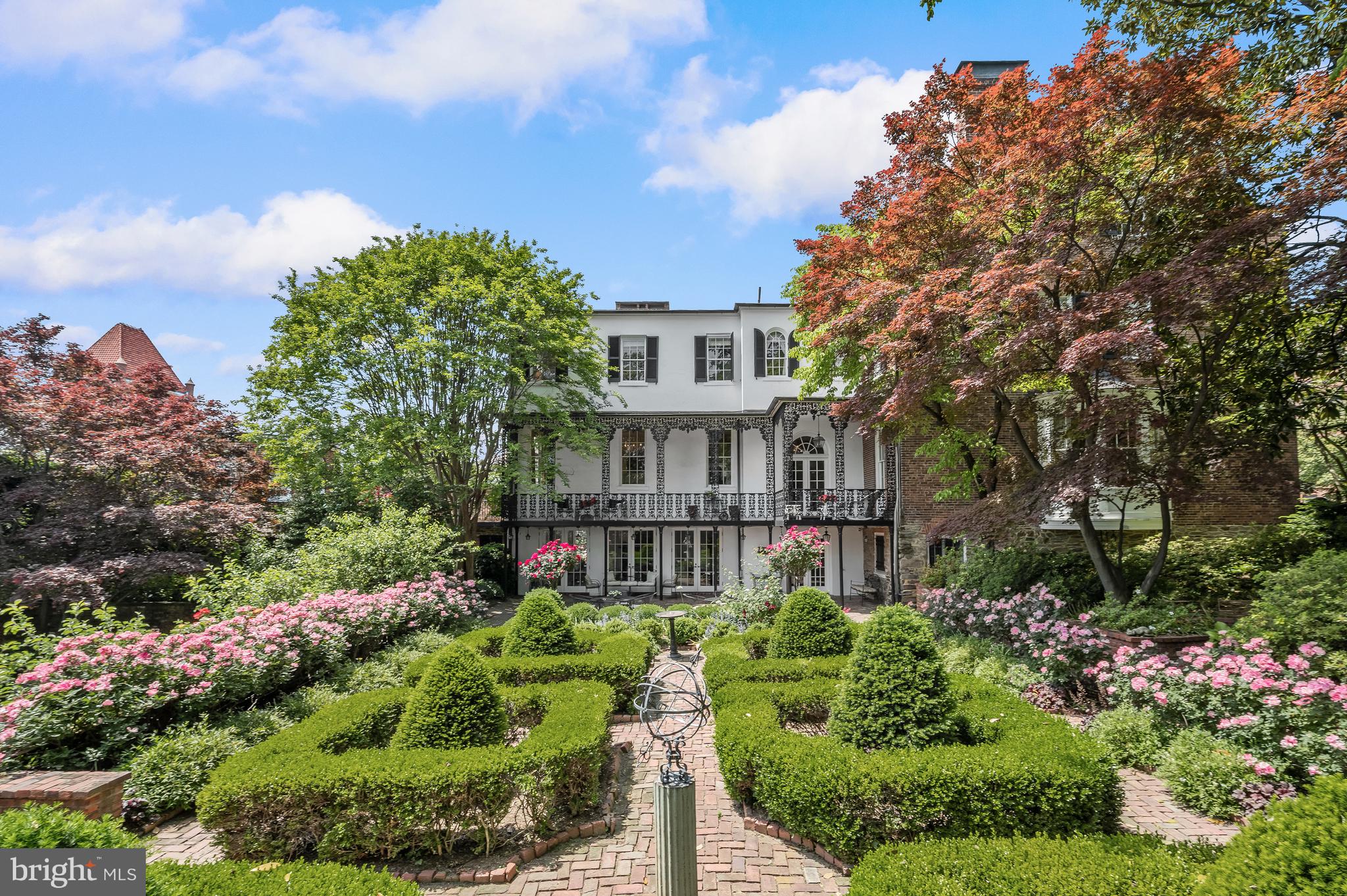 3508 Prospect Street Northwest Washington, DC 20007 - Photo 2 of 39 a front view of a house with a yard