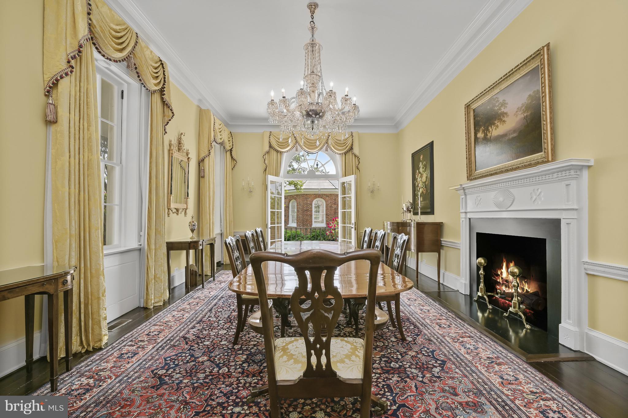 3508 Prospect Street Northwest Washington, DC 20007 - Photo 10 of 39 a view of a dining room with furniture a chandelier and wooden floor
