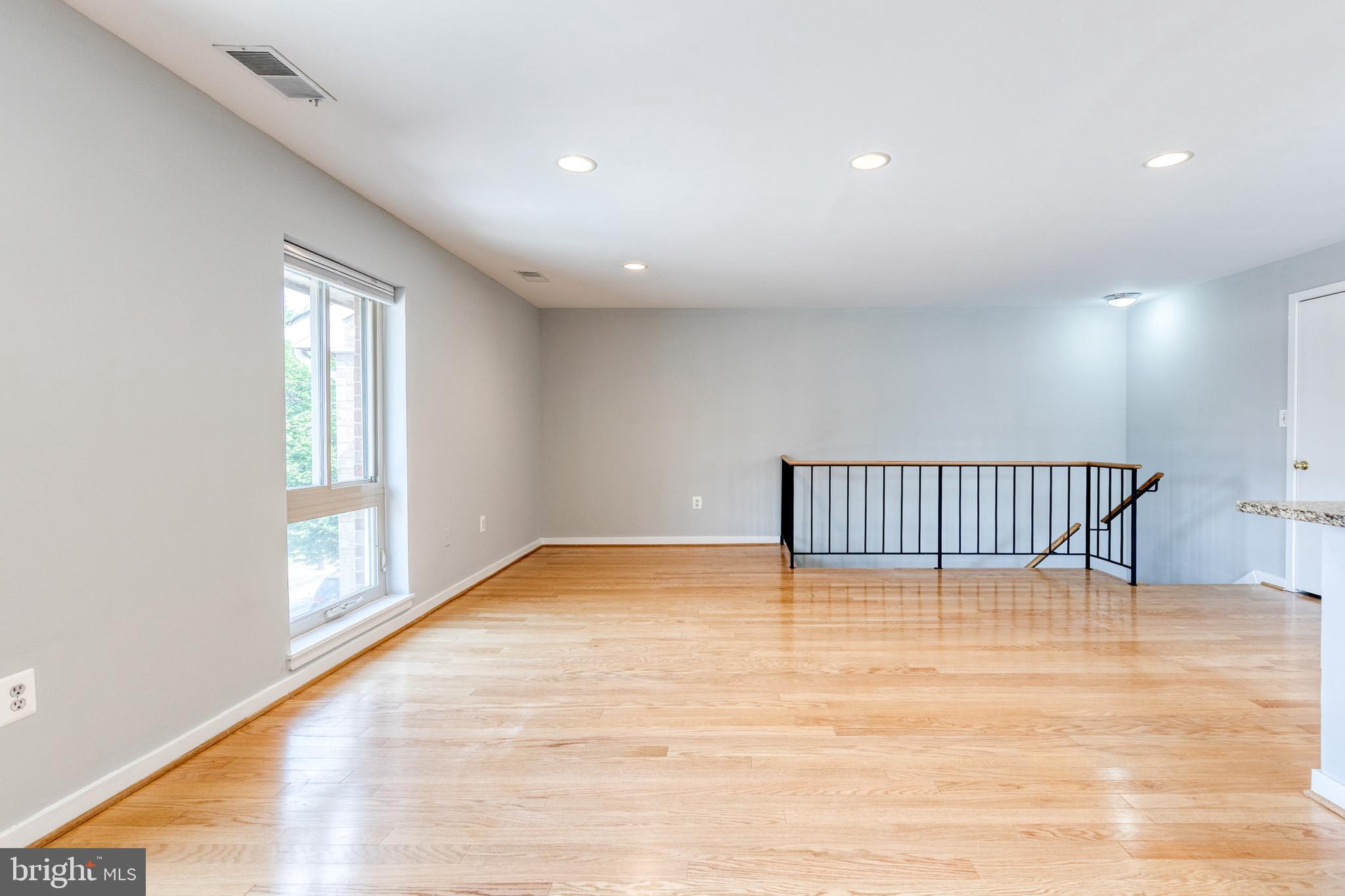 425 South Sharp Street, Unit R 15 Baltimore, MD 21201 - Photo 11 of 29 a view of an empty room with a window
