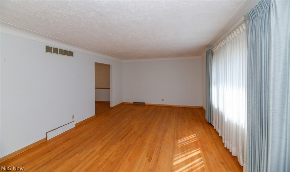 2511 Burnham Road Akron, OH 44333 - Photo 4 of 33 Spacious living room with large picture window leading into dining room