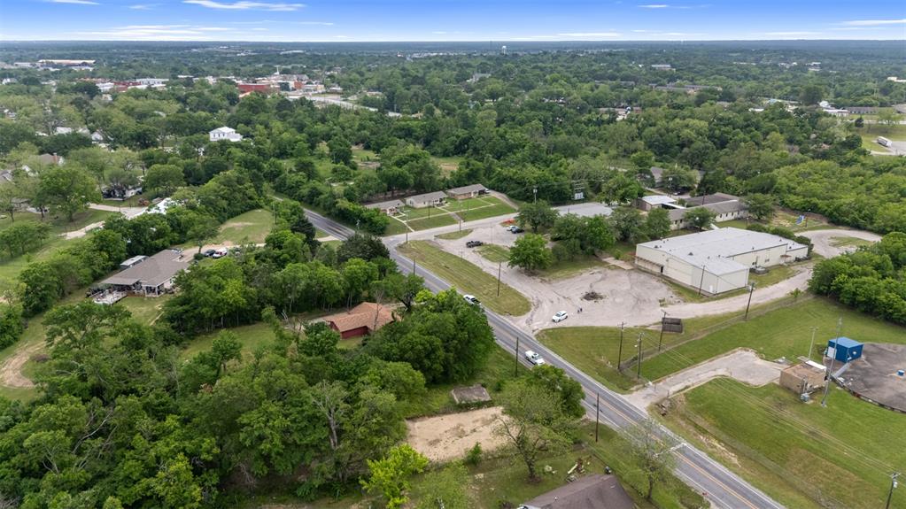 706 West Pyle Street Kaufman, TX 75142 - Photo 5 of 6 an aerial view of a house with a yard