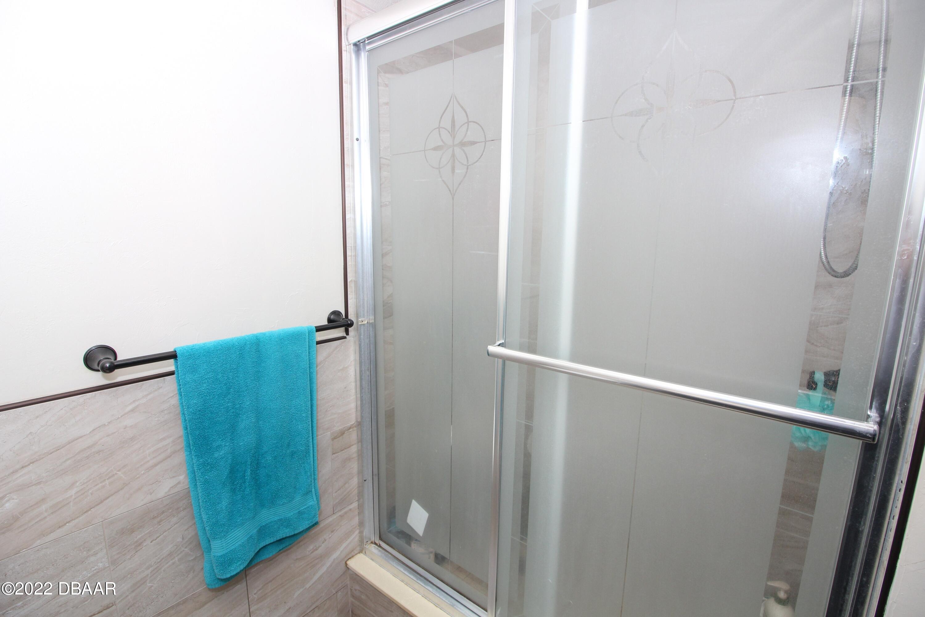 3333 South Ridgewood Avenue, Unit U27G Port Orange, FL 32129 - Photo 11 of 36 41023313-011-Downstairs_Bathroom_Alt_Vie