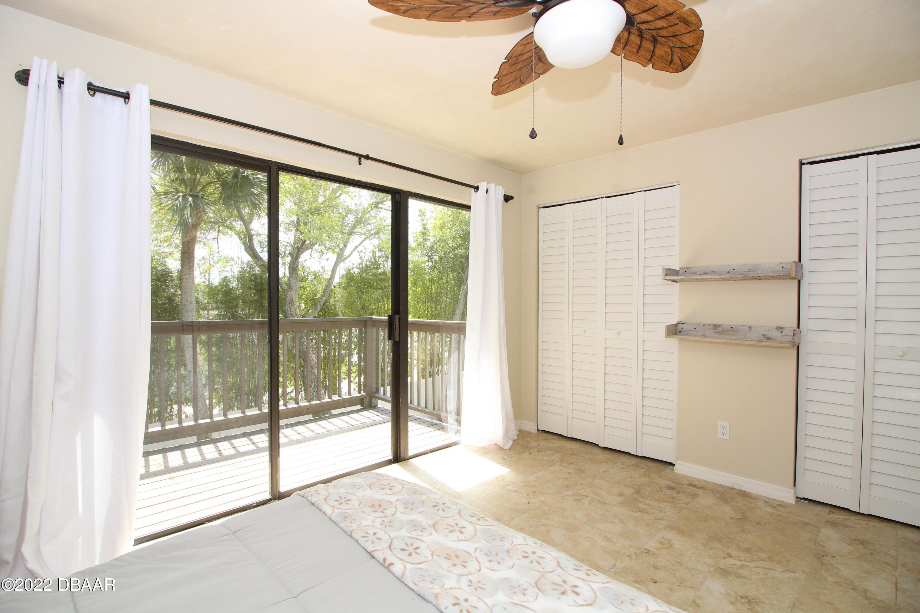 3333 South Ridgewood Avenue, Unit U27G Port Orange, FL 32129 - Photo 15 of 36 41023313-015-Master_Bedroom_Alt_View