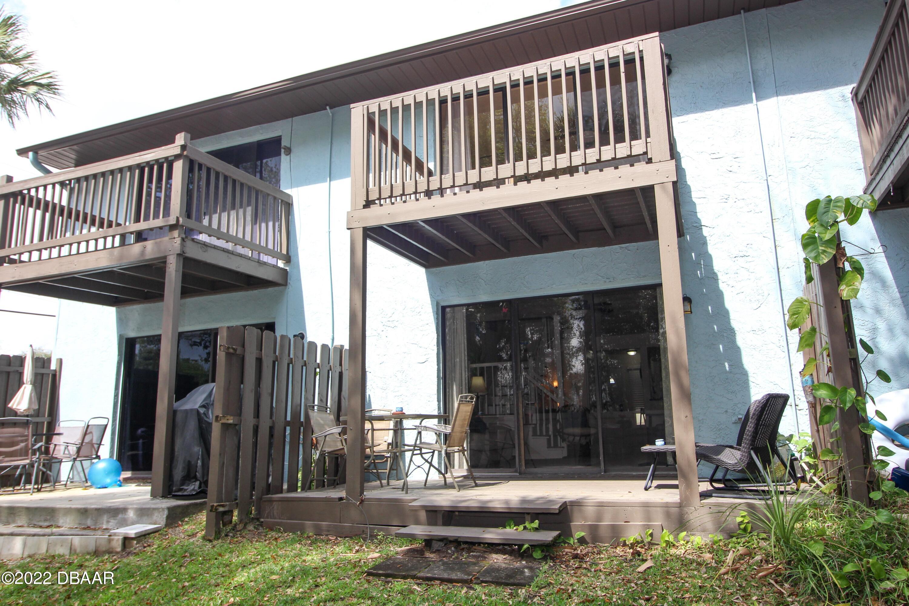 3333 South Ridgewood Avenue, Unit U27G Port Orange, FL 32129 - Photo 23 of 36 41023313-023-Back_Alt_View