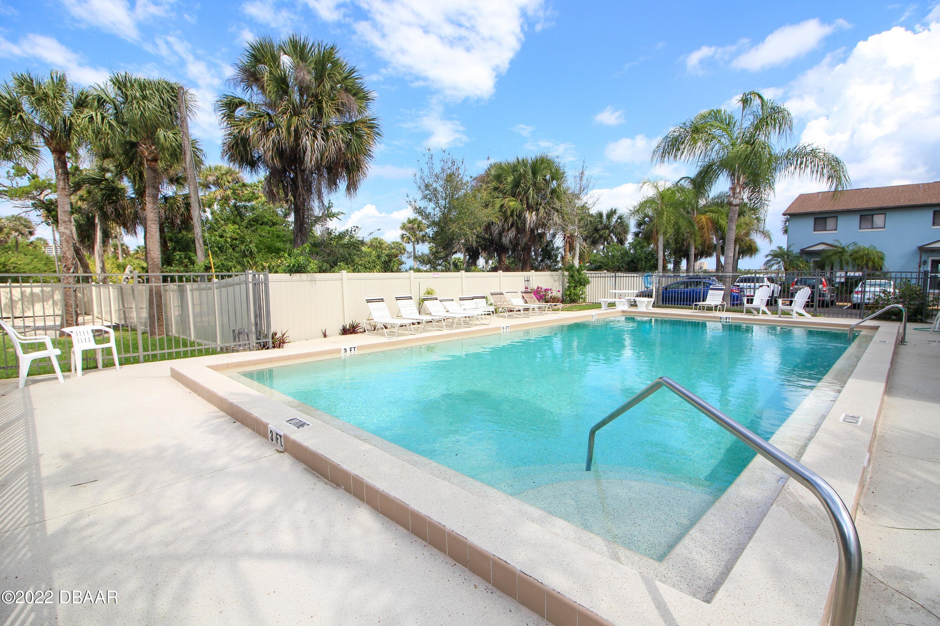 3333 South Ridgewood Avenue, Unit U27G Port Orange, FL 32129 - Photo 26 of 36 41023313-026-Pool_Alt_View