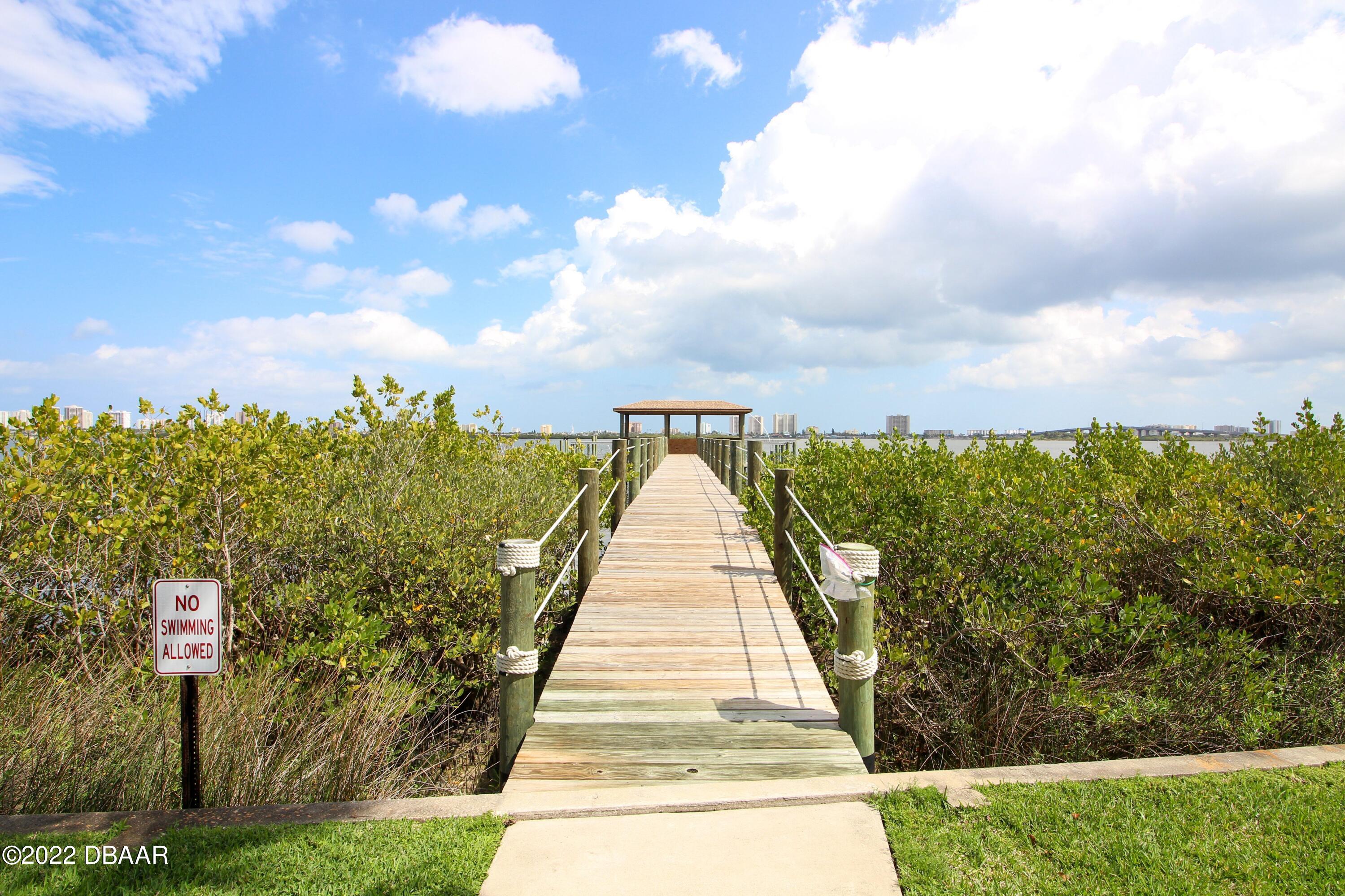 3333 South Ridgewood Avenue, Unit U27G Port Orange, FL 32129 - Photo 27 of 36 41023313-027-Community_Pier
