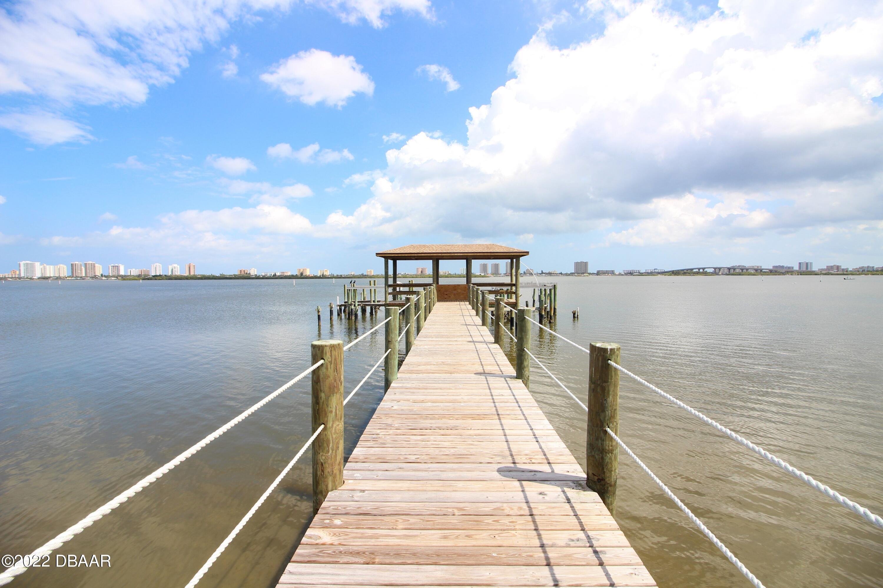 3333 South Ridgewood Avenue, Unit U27G Port Orange, FL 32129 - Photo 28 of 36 41023313-028-Community_Pier_Alt_View