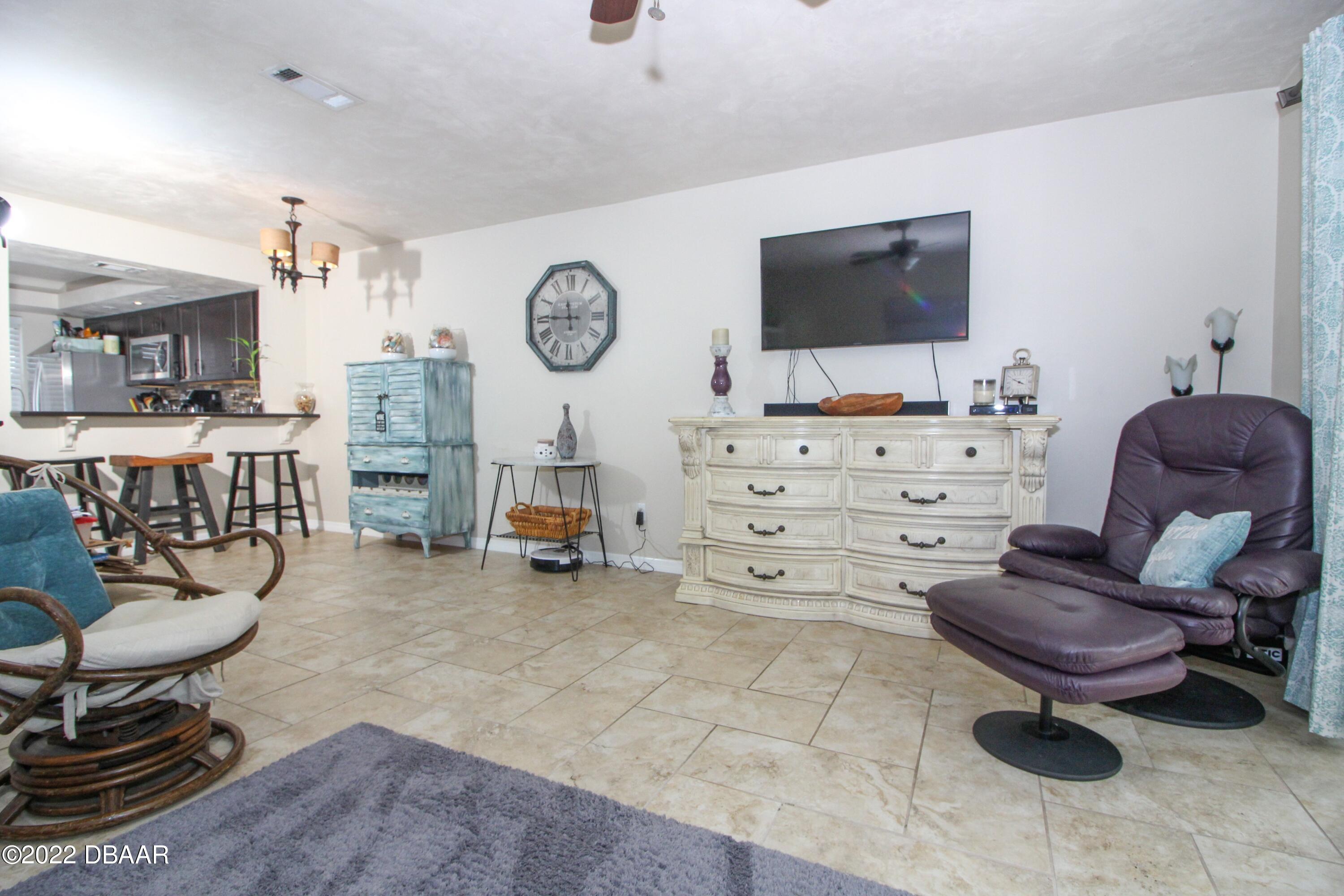 3333 South Ridgewood Avenue, Unit U27G Port Orange, FL 32129 - Photo 6 of 36 41023313-006-Living_Dining
