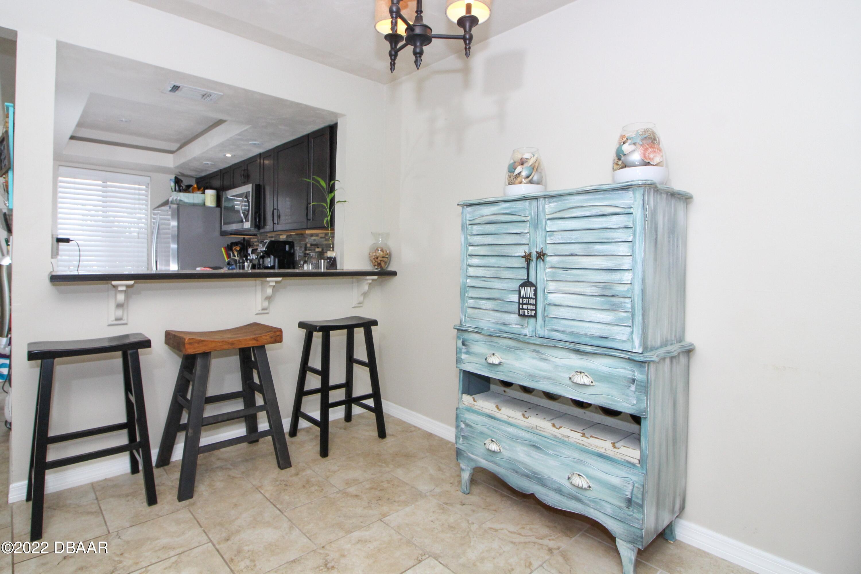 3333 South Ridgewood Avenue, Unit U27G Port Orange, FL 32129 - Photo 7 of 36 41023313-007-Dining_Kitchen