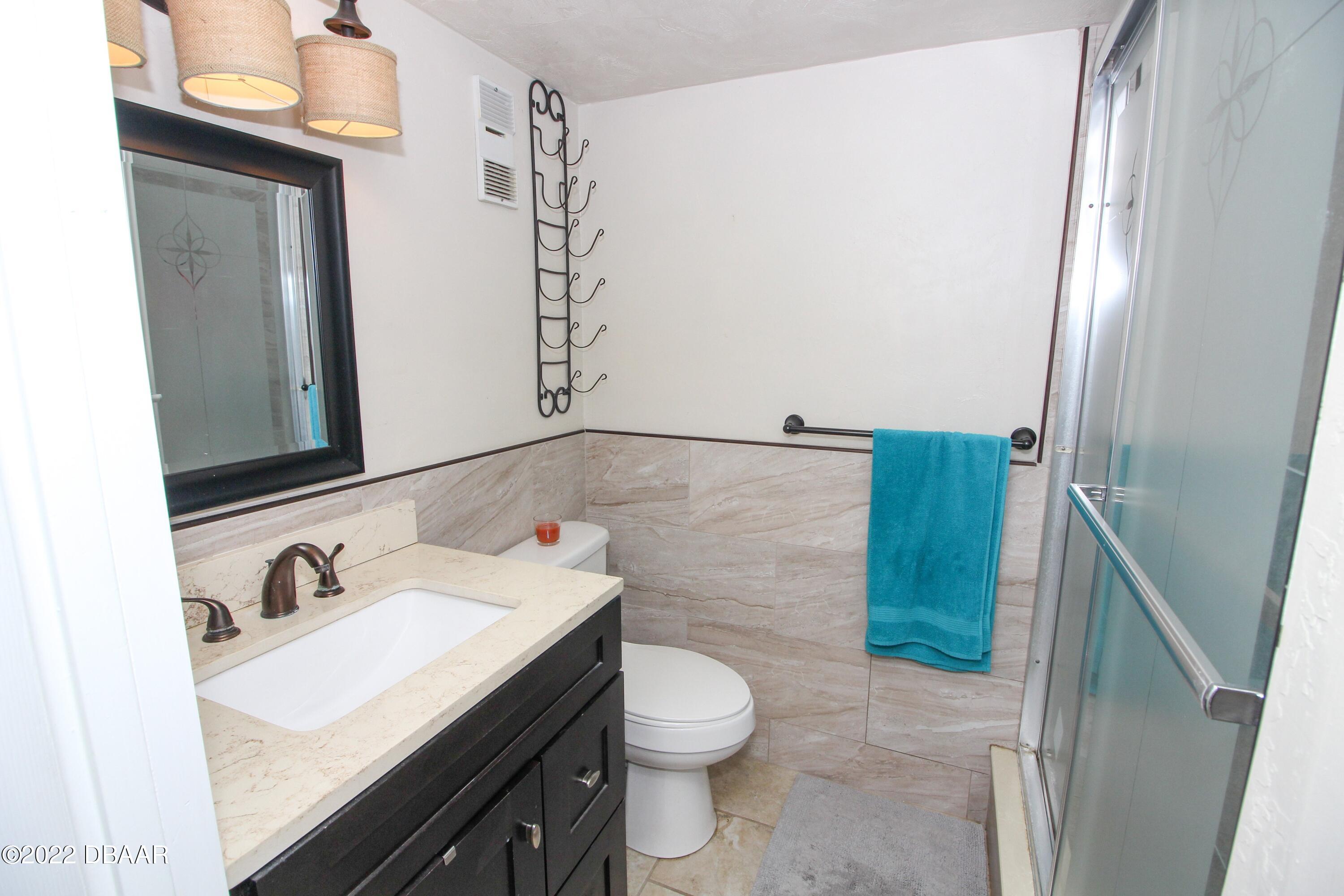 3333 South Ridgewood Avenue, Unit U27G Port Orange, FL 32129 - Photo 10 of 36 41023313-010-Downstairs_Bathroom