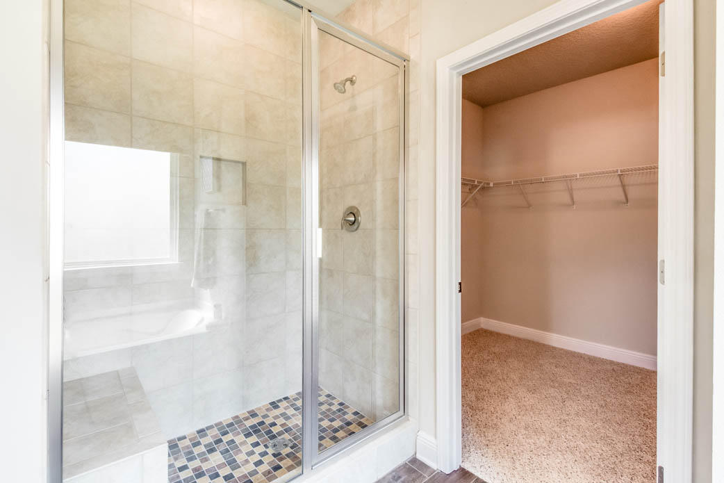 110 Conner Circle Santa Rosa Beach, FL 32459 - Photo 17 of 40 a bathroom with a shower and a glass door