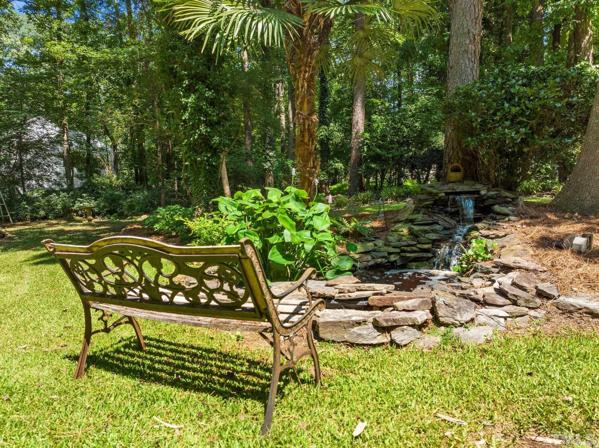 9301 Greenfield Drive Raleigh, NC 27615 - Photo 35 of 48 Peaceful oasis in the backyard.