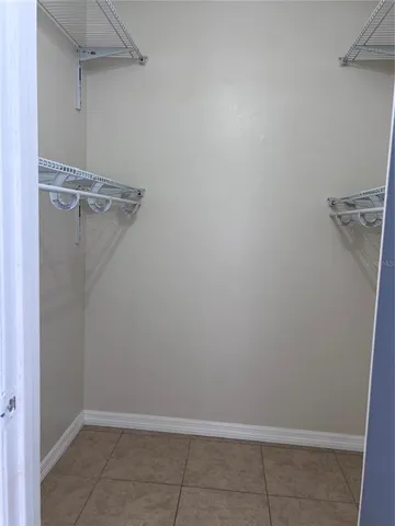 a view of a room with racks on the wall