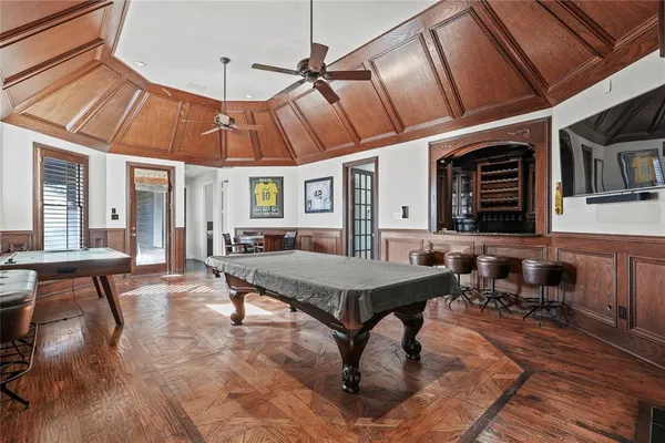 a room with furniture and wooden floor